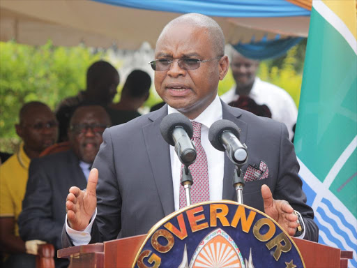 Kilifi governor Amason Kingi during the swearing in ceremony of the county's 10-member executive committee on Thursday, January 4, 2018. /ELIAS YAA