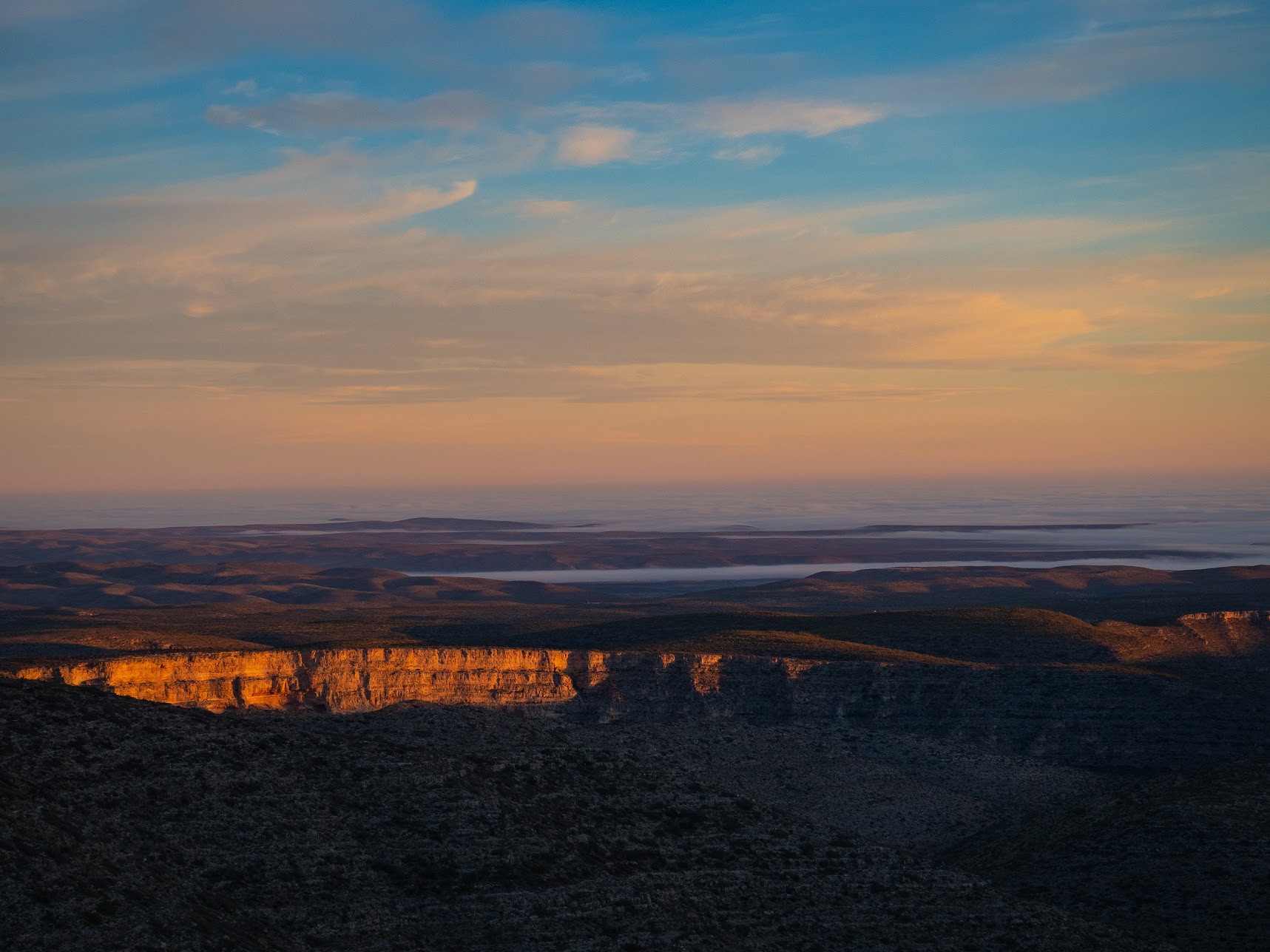 Sunrise over cliffs