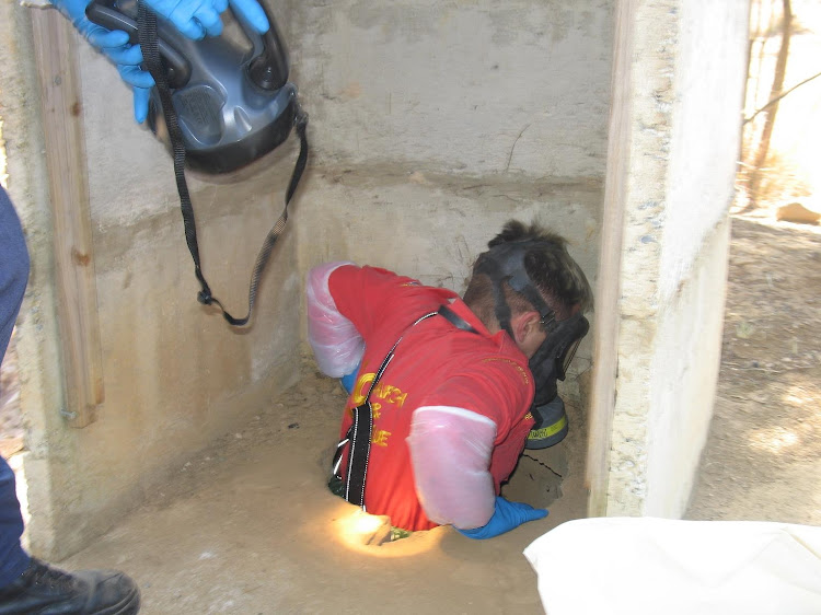 The body of a missing woman was found in a pit toilet, similar to the one in this file pic.