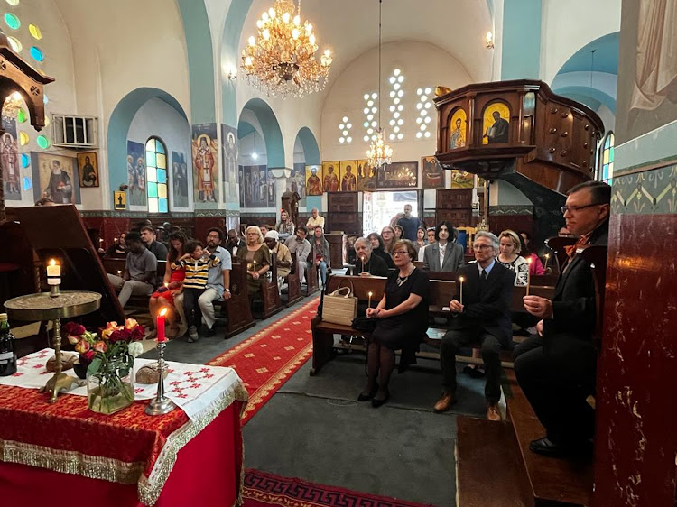 Guests gathered during the commemoration service for the victims of the Holodomor genocide at the Orthodox Patriarchal Cathedral of Sts. Cosmas and Damian on Valley Road, Nairobi on November 25, 2023.