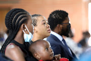 A sombre mood at the memorial service. 