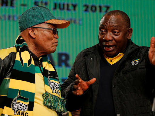 South Africa's President Jacob Zuma (L) chats to his deputy Cyril Ramaphosa ahead of the African National Congress 5th National Policy Conference at the Nasrec Expo Centre in Soweto, South Africa, June 30, 2017. /REUTERS