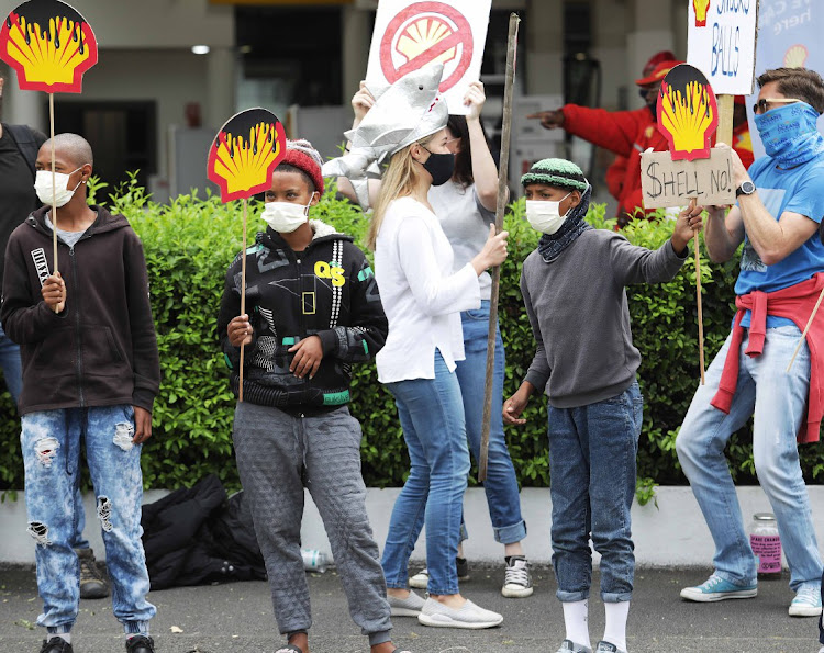 Extinction Rebellion and other environmental activists protest at Shell in Newlands, Cape Town, against the Wild Coast seismic survey commissioned by the company