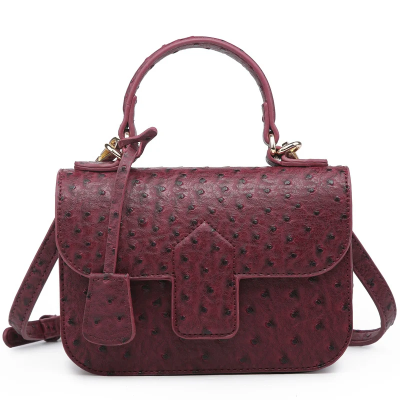 Ostrich pattern magnetic buckle shoulder bag. Carry your essentials with style and security, this bag combines elegance 