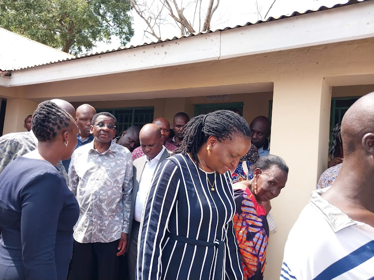 Siaya Governor James Orengo, his deputy William Oduol and Chief Registrar of the Judiciary Anne Amadi after the inspection of a new magistrates court in Yala.