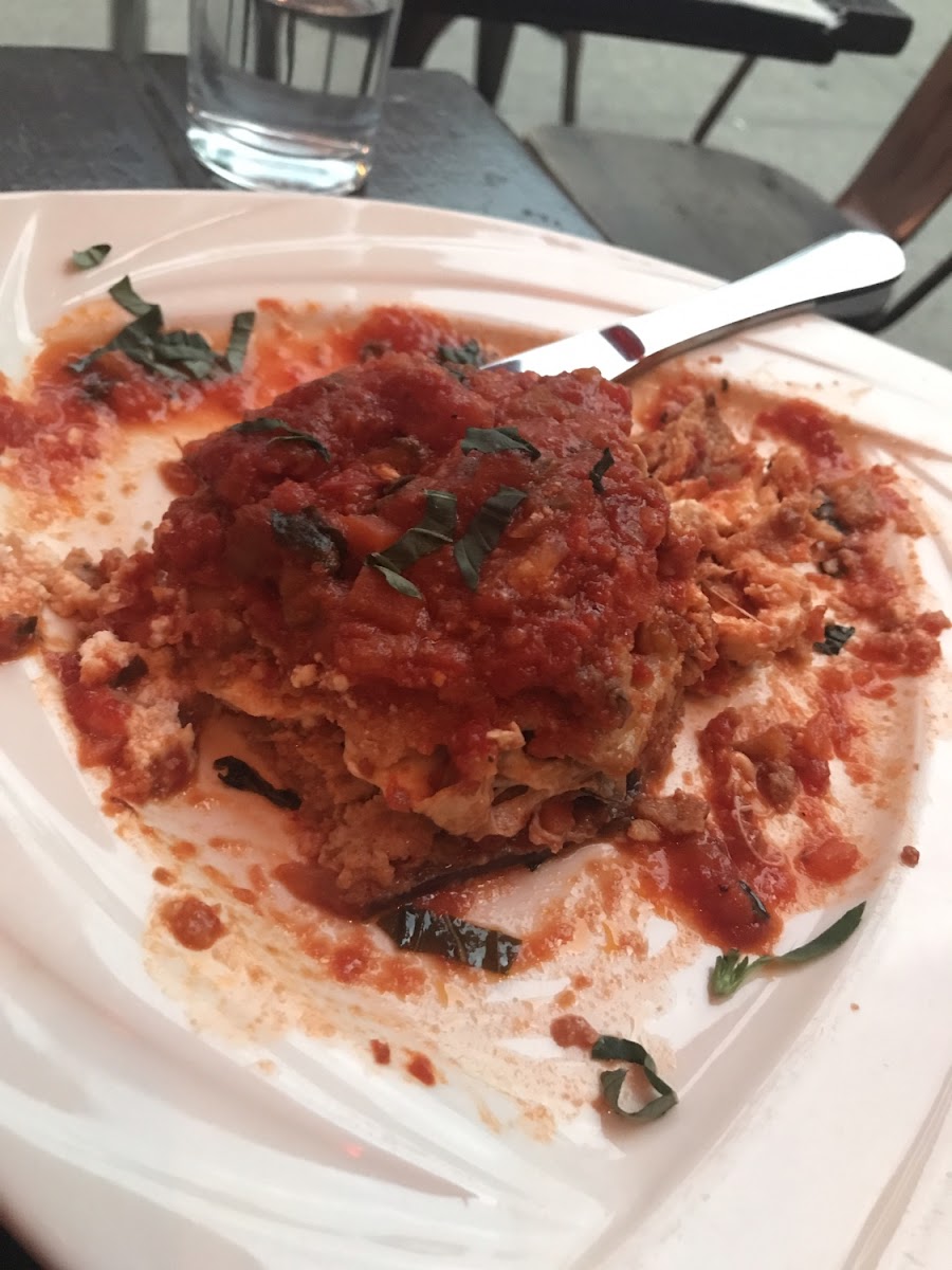 Eggplant Parmesan ( already started eating because it was tasty ) sorry for the bad picture.