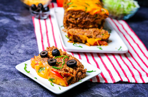 A slice of Taco Meatloaf on a plate.