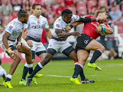 Sharks clash against the Lions during the Super Rugby at Ellis Park.