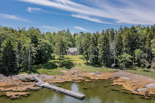 Buy this luxury house in Saint George (United States) - House surrounded by trees with a pier