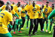 Baroka FC head coach Wedson Nyirenda celebrates with his players after winning the Telkom Knockout in December 2018.  