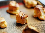 Delicious Cheddar Puffs | The Pioneer Woman Cooks | Ree Drummond was pinched from <a href="http://thepioneerwoman.com/cooking/2009/12/cheese-puffs/" target="_blank">thepioneerwoman.com.</a>