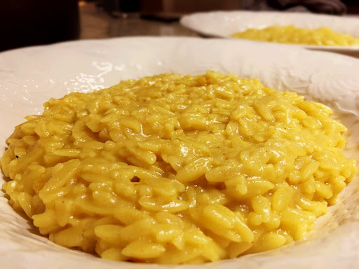 Cooked orzo pasta in a bowl.