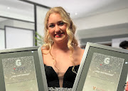 Swimmer Lara van Niekerk with her two awards at the gsports Awards at ceremony in Johannesburg.