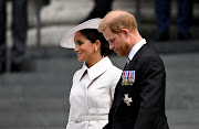 Britain's Prince Harry and his wife Meghan, Duchess of Sussex, leave after the National Service of Thanksgiving held at St Paul's Cathedral as part of celebrations marking the Platinum Jubilee of Britain's Queen Elizabeth, in London, Britain, June 3, 2022.