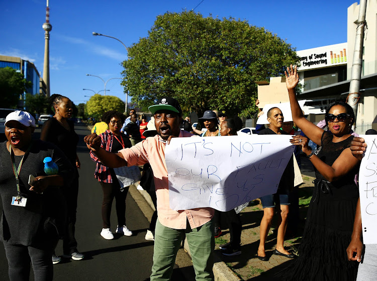 SABC employees picketing outside SABC Building in Auckland Park for salary increase.