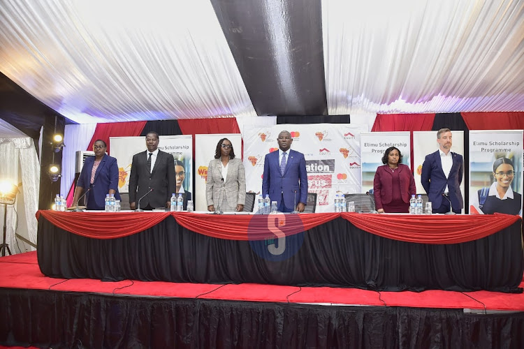 Pangani girls principal Florence Ngarari, Acting sub -county Director of Eduction Clement Osano, Assistant Director Quality Assurance Lydia Gicheru, Equity CEO James Mwangi, Head of Equity Group Foundation Beth Waweru and Representative of kwf Benjamin Graedler during the 13th Annual Education and Leadership Congress for Wings to Fly and Elimu Scholarship beneficiaries at Pangani Girls School, Nairobi County on August 23, 2023.