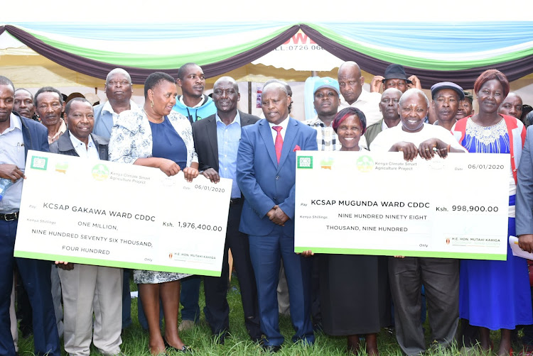 Nyeri Governor Mutahi Kahiga (C) when he presented cheques to groups in January this year