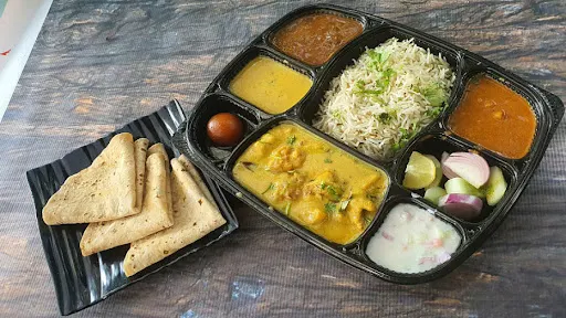 Punjabi Kadhi Pakoda +chatpatta Sukhe Aloo+2 Butter Roti+ Rice