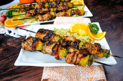 Chicken Bacon Kabobs on a plate.