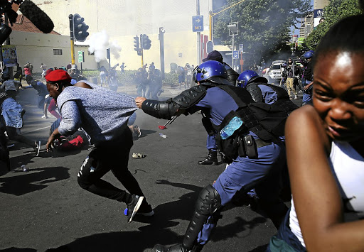 Police take action against students in Braamfontein, Johannesburg, during #FeesMustFall protests at Wits University in 2016.