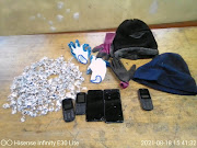 The men were found in possession of hand gloves, balaclavas, cell phones and jewellery with an estimated value of R100,000.