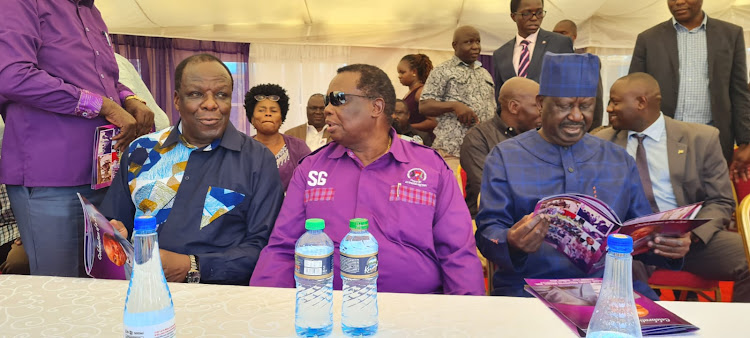 ODM Deputy party leader Wycliff Oparanya, Cotu Secretary General Francis Atwoli and Azimio Chief Raila Odinga during the burial ceremony of former Cotu chairman Rajab Mwondi in Vihiga county on September 2, 2023.