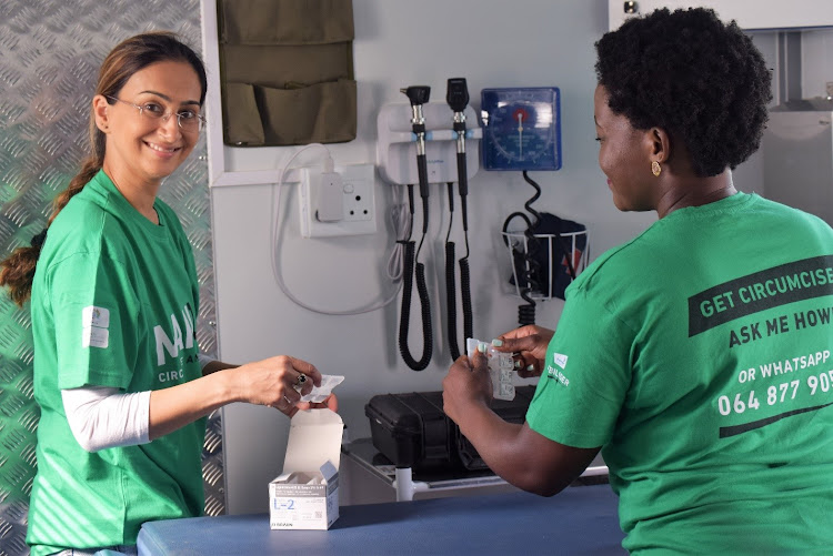 Health staff with the organisation ManUp prepare for a circumcision. The organisation promotes male circumcision and has a mobile clinic which provides the service free.