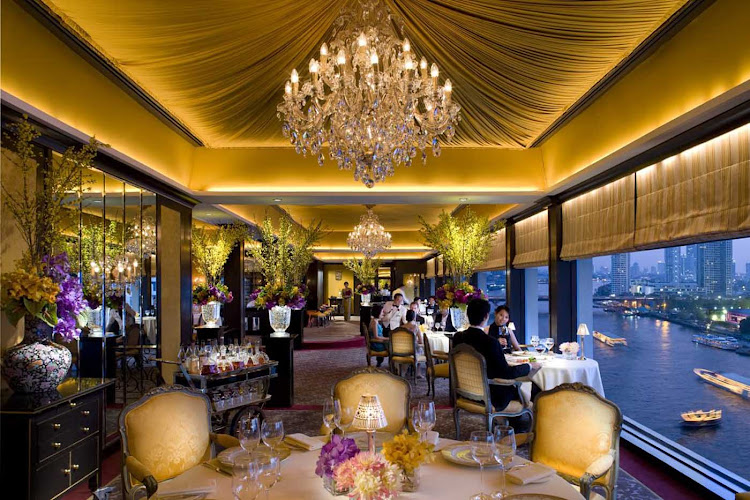 The dining room at Le Normandie, inside Mandarin Oriental, offers scenic views of the Chao Phraya river in Bangkok. 