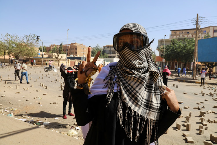 A protester takes part in a march against military rule in Khartoum, Sudan, on Monday. Picture: EL TAYEB SIDDIG/REUTERS