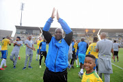 Pitso Mosimane celebrates with his players and supporters during the Absa Premiership match between Mamelodi Sundowns and Ajax Cape Town at Lucas Moripe Stadium on April 28, 2018 in Pretoria, South Africa. 