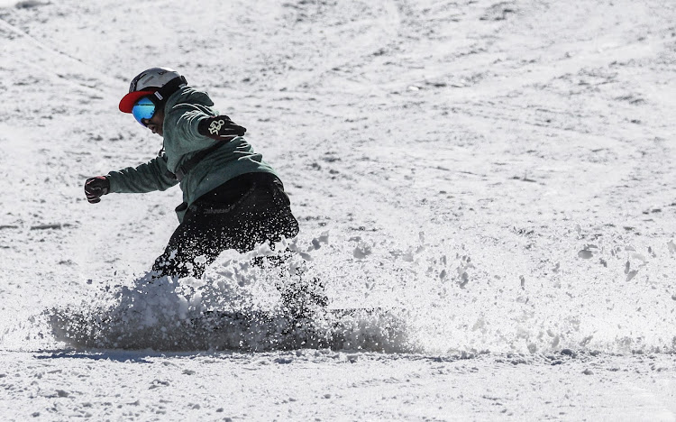 Hope Ramokotjo snowboards at Kapoko Snow Park at Afriski Mountain Resort in Butha Buthe.