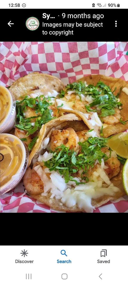 Shrimp Tacos with onion and cilantro.