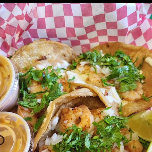 Shrimp Tacos with onion and cilantro.