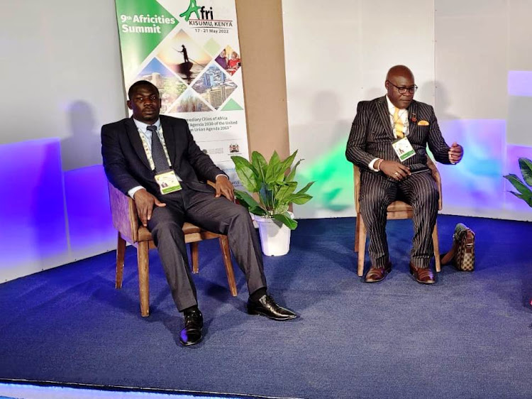 Migori governor aspirant Robert Okong’o with his running mate Michael Nyabuta during the Africities summit in Kisumu on Thursday.