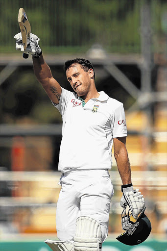 Test debutant Faf du Plessis celebrates his century on day five of the riveting second Test between Australia and South Africa which ended in a draw in Adelaide yesterday Picture: CAMERON SPENCER/GETTY IMAGES