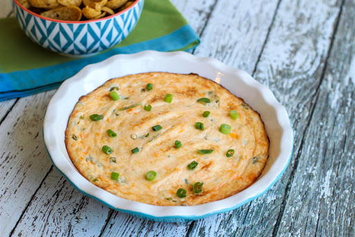 Cheese Dip That Will Make You Famous in a serving bowl.