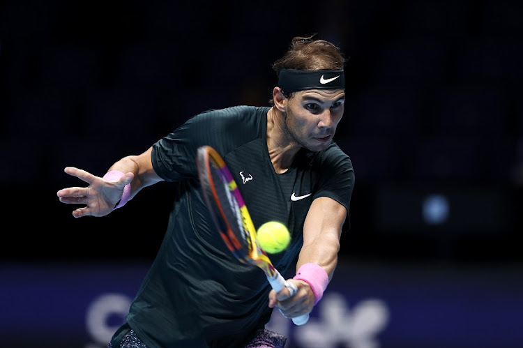 Rafael Nadal of Spain plays a backhand during his singles semi final match against Daniil Medvedev of Russia during day seven of the Nitto ATP World Tour Finals at The O2 Arena on November 21, 2020 in London, England.