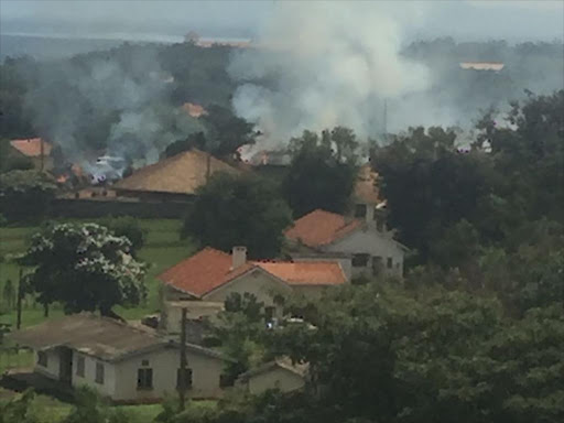 Smoke seen from the compound of King Mumbere's home./COURTESY