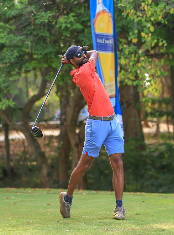 A golfer in action at the Nyali Golf Club during the Johnnie Walker Golf Series on Saturday.