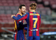 Lionel Messi celebrates scoring with Antoine Griezmann during a Uefa Champions League Group G match against Dynamo Kyiv at Camp Nou, in Barcelona, on November 4, 2020.