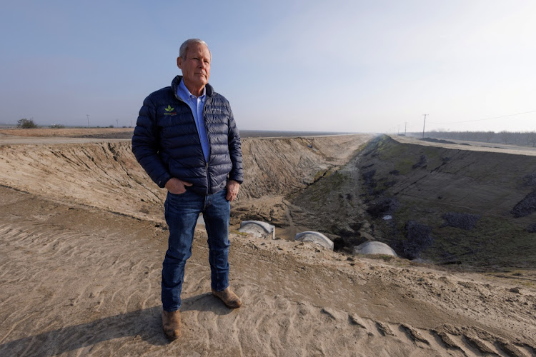 Don Cameron stands next to one of his flood capture projects on his Terranova Ranch in Helm, California, the US, January 25 2023. Picture: MIKE BLAKE/ REUTERS