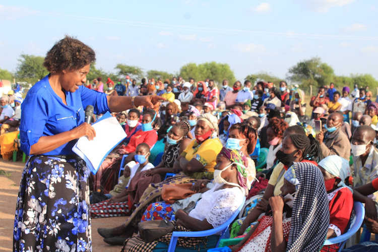 Governor Charity Ngilu with Nzalae residents in Mwingi West