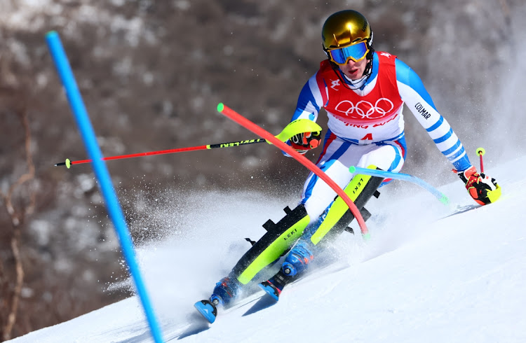 Clement Noel of France going for gold in the men's slalom run on February 16 2022 . Picture: REUTERS/DENIS BALIBOUSE