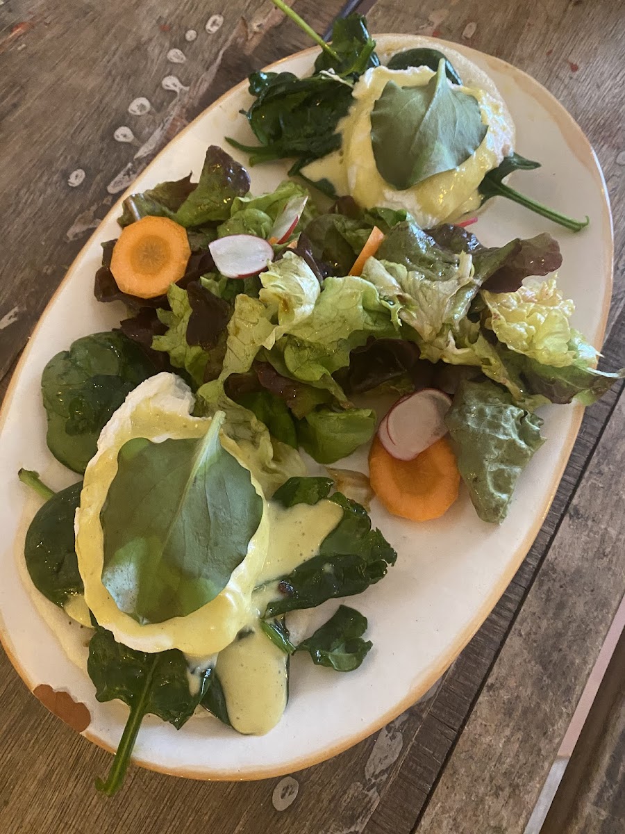 Eggs benedict with oyster leaves and uthapam