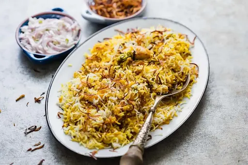 Hyderabadi Chicken Dum Biryani With Raita And Salan
