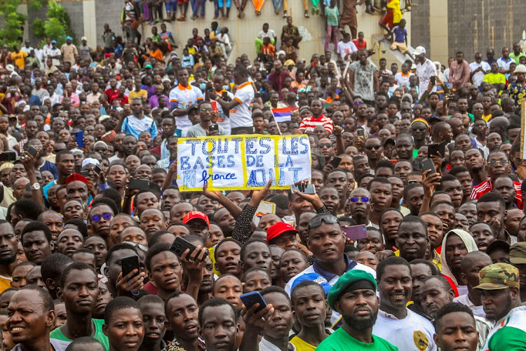 Thousands of protesters gather in support of the junta soldiers in Niger’s capital, Niamey, on August 3. Picture: MAHAMADOU HAMIDOU/REUTERS