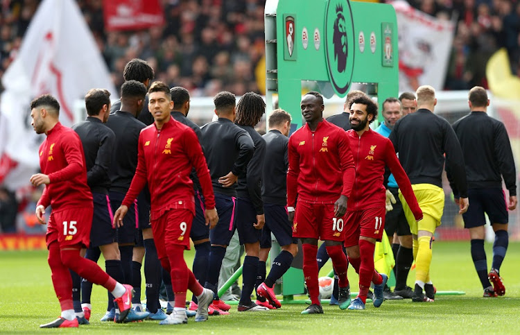 Liverpool's Joe Gomez, Fabinho, James Milner and Georginio Wijnaldum before the Premier League match between AFC Bournemouth at Anfield on March 07, 2020 in Liverpool, United Kingdom.