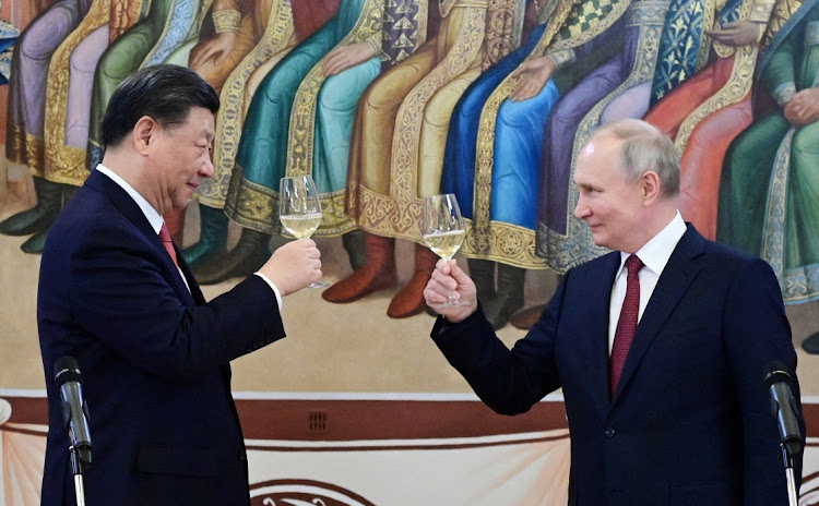 Russian President Vladimir Putin and Chinese President Xi Jinping attend a reception at the Kremlin in Moscow, Russia, March 21 2023. Picture: SPUTNIK/PAVEL BYRKIN/REUTERS