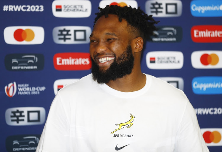 Springbok centre Lukhanyo Am smiles during a press conference at Grand Hotel des Sablettes Plage on October 6, 2023 in La Seyne-sur-Mer, France.