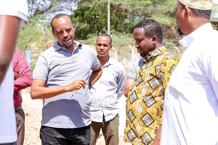 Garissa Water and Sewerage Company MD Mohamed Dola and Garissa Deputy Governor Abdi Dagane